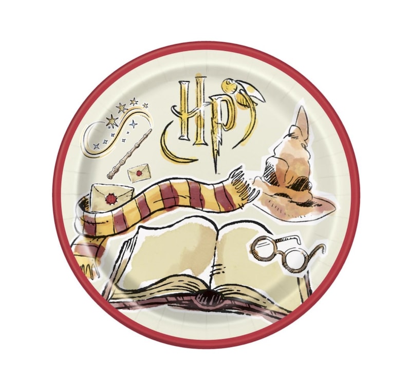 May include: Round paper plate with a red border. The plate features illustrations of a scarf, book, glasses, wand, envelope, and the letters "HP" with a lightning bolt. The background is cream-coloured.