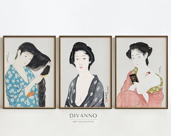 May include: Three framed prints of Japanese women in traditional clothing. The woman on the left is brushing her long black hair. The woman in the middle is looking at the viewer. The woman on the right is holding a small black object in her hand.