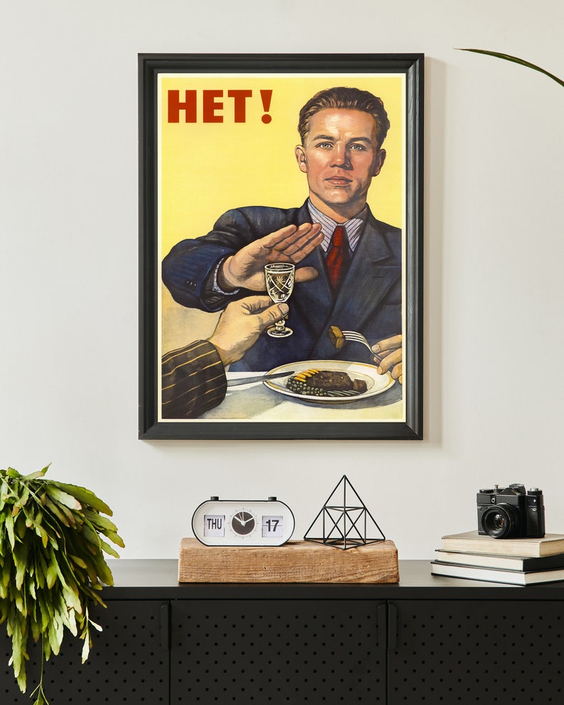 May include: A vintage Soviet propaganda poster with a man in a suit saying "HET!" while refusing a glass of alcohol and a plate of food.