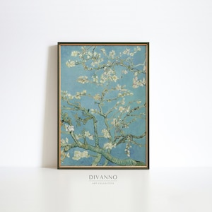 Puede incluir: Una impresi&oacute;n enmarcada de una pintura que representa un almendro en flor blanco sobre un fondo de cielo azul. La pintura est&aacute; en el estilo de Vincent van Gogh. El marco es de color verde oscuro.
