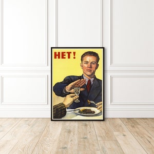 May include: A vintage propaganda poster with a man in a suit saying "HET!" with his hand raised in a stop gesture. He is refusing a glass of alcohol and a plate of food.