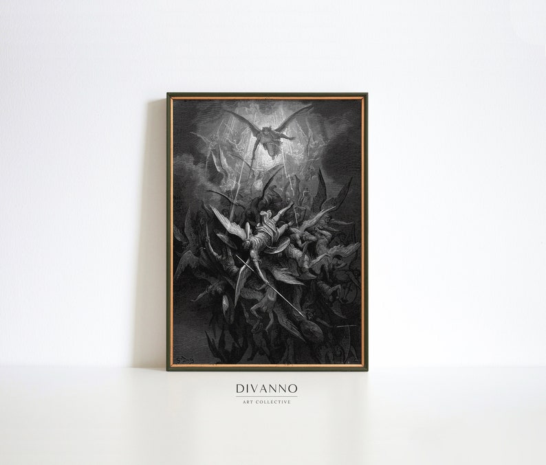May include: A black and white print depicting a dramatic scene of angels battling demons. The print is framed in a dark green frame with a gold inner border. The print is titled "DIVANNO ART COLLECTIVE".