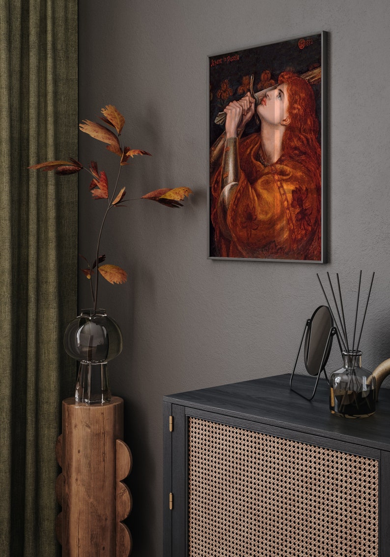May include: A framed painting of a woman in a red dress holding a sword, with the title "Ave it Pute" above the image.