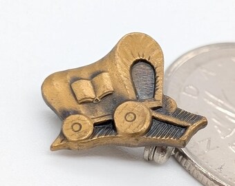 Vintage Covered Wagon Lapel Pin | Pioneer Open Book Motif | Antiqued Brass-Toned Metal | 1970s 1980s Western Brooch