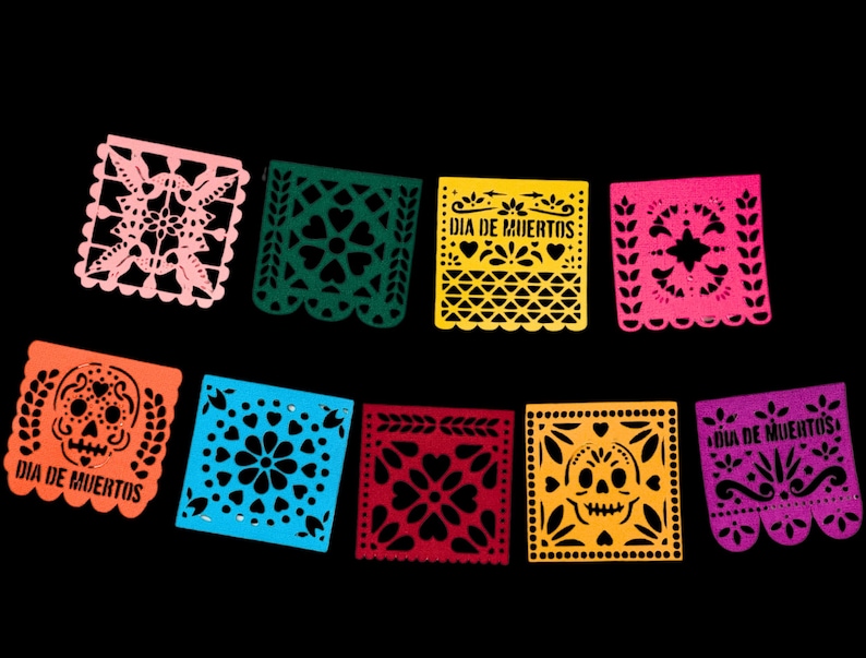 May include: A set of ten colorful paper banners with a Day of the Dead theme. The banners feature various designs, including skulls, flowers, and the text "Dia de Muertos".