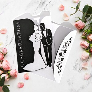 Elegant Wedding Gate Fold Card SVG by Bella Carta Design template for Cricut cutting machines features a bride and groom in classic black and white.