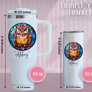 May include: White tumblers with an owl design. The larger tumbler is 10.59 inches tall and 3.9 inches wide, holding 40 oz. The smaller tumbler is 8.25 inches tall and 2.75 inches wide, holding 20 oz. Both have a straw and the name "Abbey".