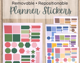 May include: Set of six sheets of planner stickers with various shapes and colors. The stickers include squares, rectangles, stars, hexagons, circles, and arrows. The colors include pink, green, red, blue, yellow, purple, and brown.