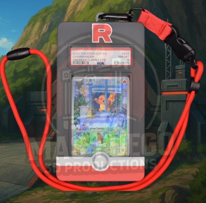 May include: A gray card holder with a red lanyard, featuring a Pok&eacute;mon trading card. The card displays a Charmander illustration with the text "Heat Tackle." The holder has the letter "R" and text that reads "2023 Pokemon SVP EN Charmander Obsidian Flames ETB."