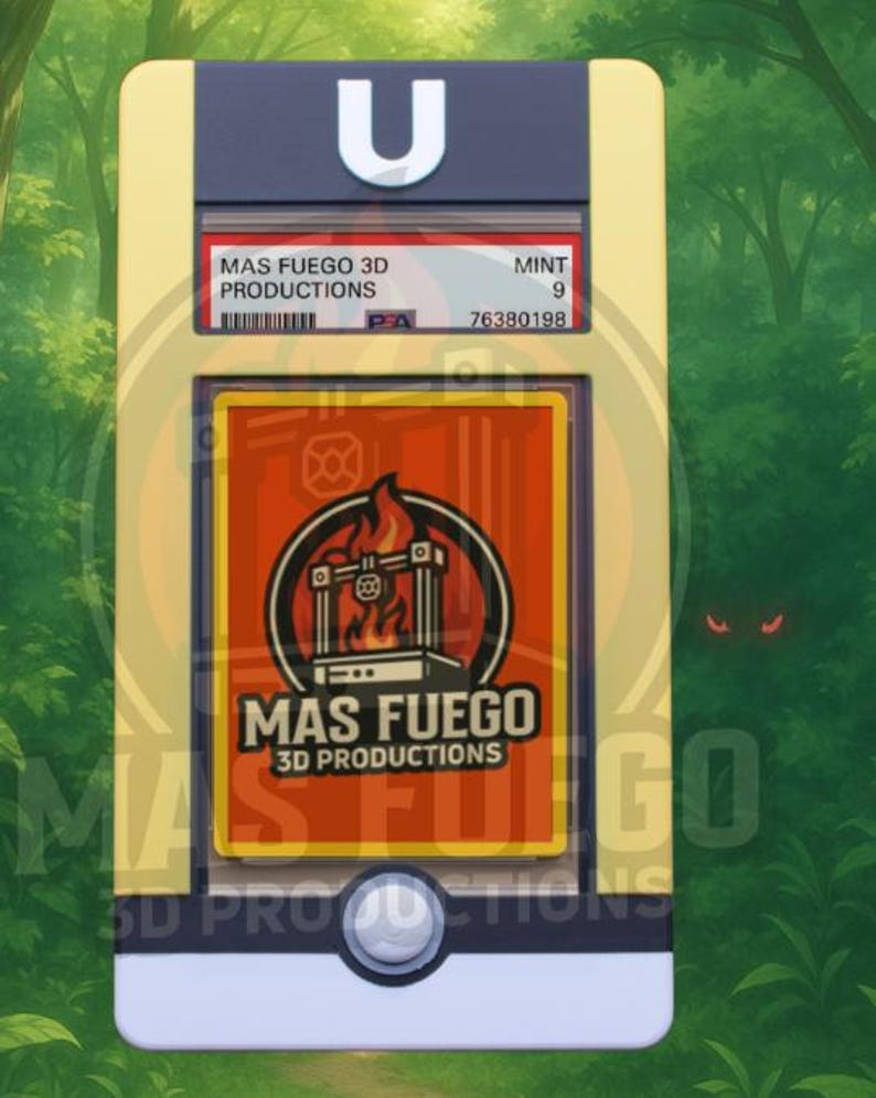 May include: A yellow, white, and black card holder with the text "MAS FUEGO 3D PRODUCTIONS" and "MINT 9". The holder has a large white "U" on top and a circular button at the bottom. The background is a green forest.