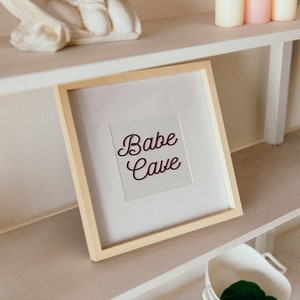 Trendy, roze en zwart &quot;Babe Cave&quot; muurkunst