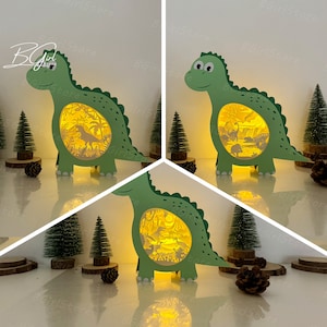 Plantilla de caja de dinosaurios recortada en papel (paquete de 3), caja de luz recortada en papel con linterna 3D (SVG) DIY, corte Cricut, corte de papel con caja de sombras