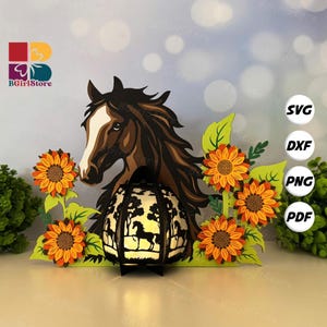 May include: A decorative horse-themed lantern with a cutout design, featuring a horse silhouette and surrounded by sunflowers. The lantern is black, with a brown and white horse head and sunflowers in shades of orange and yellow. The image includes the text "SVG, DXF, PNG, PDF".