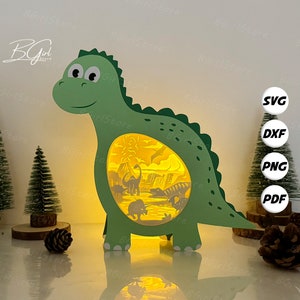 Plantilla de caja de dinosaurios recortada en papel Dinosaurios 2, caja de luz recortada en papel con linterna 3D SVG DIY, corte Cricut, corte de papel con caja de sombras