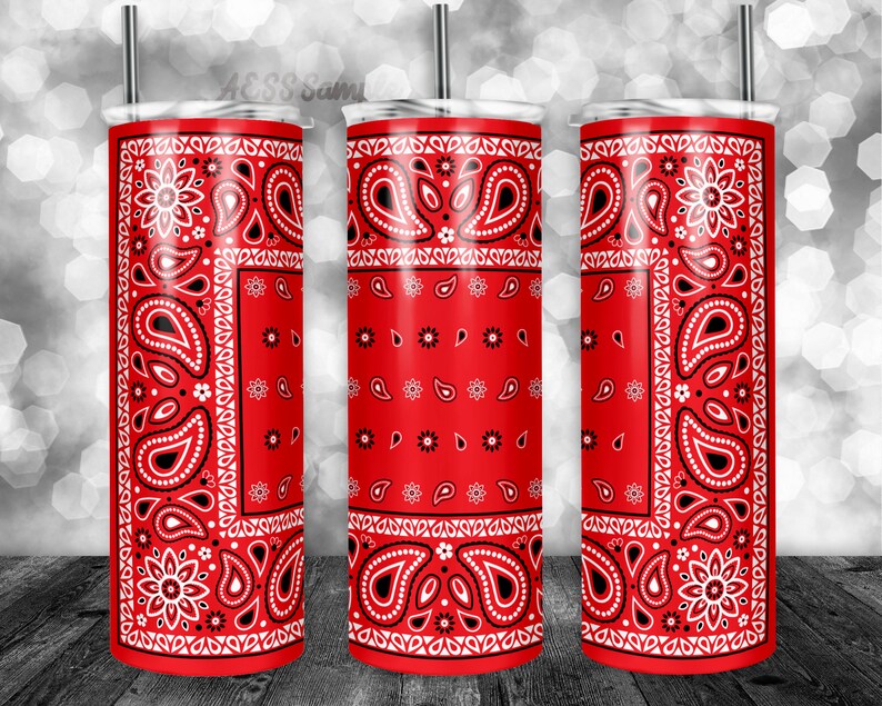 May include: Three red stainless steel tumblers with a white bandana pattern. The tumblers are all the same size and have a black lid.