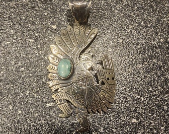 German silver pendant with an eagle dancer design