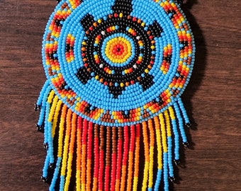Beaded Medallion Necklace with a turtle design