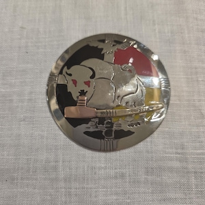 German silver pendant with a Buffalo and 4 directions design