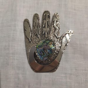 German silver pendant with a Southwest Silverwork design