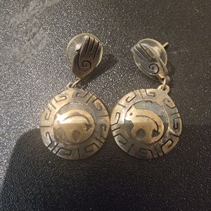 German silver earrings with a bear design