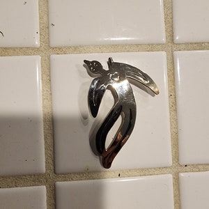 German silver broach with a scissortail bird design