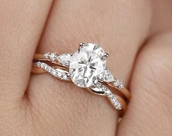 オーバルモアッサナイト婚約指輪セット 14Kローズゴールド結婚指輪セット アニバーサリーリング ツイストバンド、アニバーサリーギフト、クラスターダイヤモンドリングセット