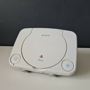 PlayStation 1 Slim / PS1 Slim Console Shelf Display Stand - Gaming Stands - Grey