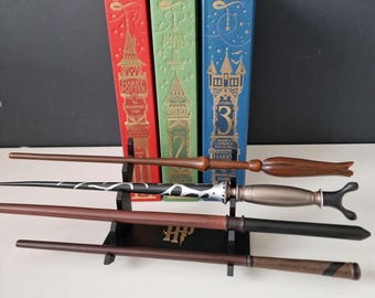 Soporte para varitas de Harry Potter de 4 niveles (negro o dorado)