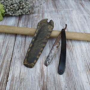 Vintage Black Straight Razor with Leather Case: Collectible Barber Tool