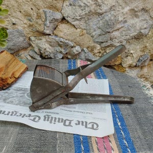 Vintage metal press, Primitive puree device, Rusty old press, Kitchen antique, Hand tool for mashing potatoes, Fruit and vegetable press