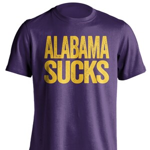 Alabama Sucks - Alabama Haters Smack Talk T-Shirt - Purple and Gold Shirt -  Haters Gonna Hate - Multiple Color Options - Parody Apparel