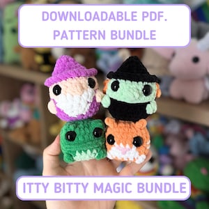 May include: A collection of four crocheted amigurumi figures in various colors. The figures include a purple gnome, a green witch, a green frog, and an orange cat. The image includes the text "DOWNLOADABLE PDF. PATTERN BUNDLE" and "ITTY BITTY MAGIC BUNDLE".