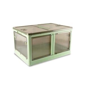 May include: A green plastic storage box with two clear doors. The box has a brown top and a textured surface.