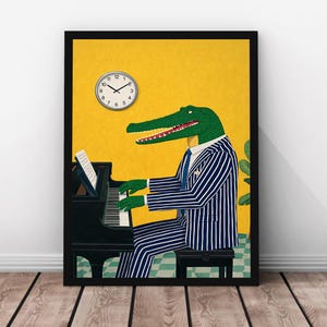 May include: A framed art print featuring an anthropomorphic alligator playing a black piano. The alligator is wearing a blue and white striped suit and a blue tie. A clock hangs on the yellow wall. The artwork is in a black frame.