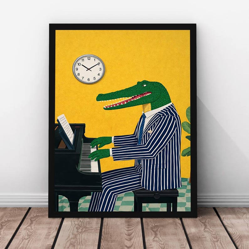 May include: A framed art print featuring an anthropomorphic alligator playing a black piano. The alligator is wearing a blue and white striped suit and a blue tie. A clock hangs on the yellow wall. The artwork is in a black frame.