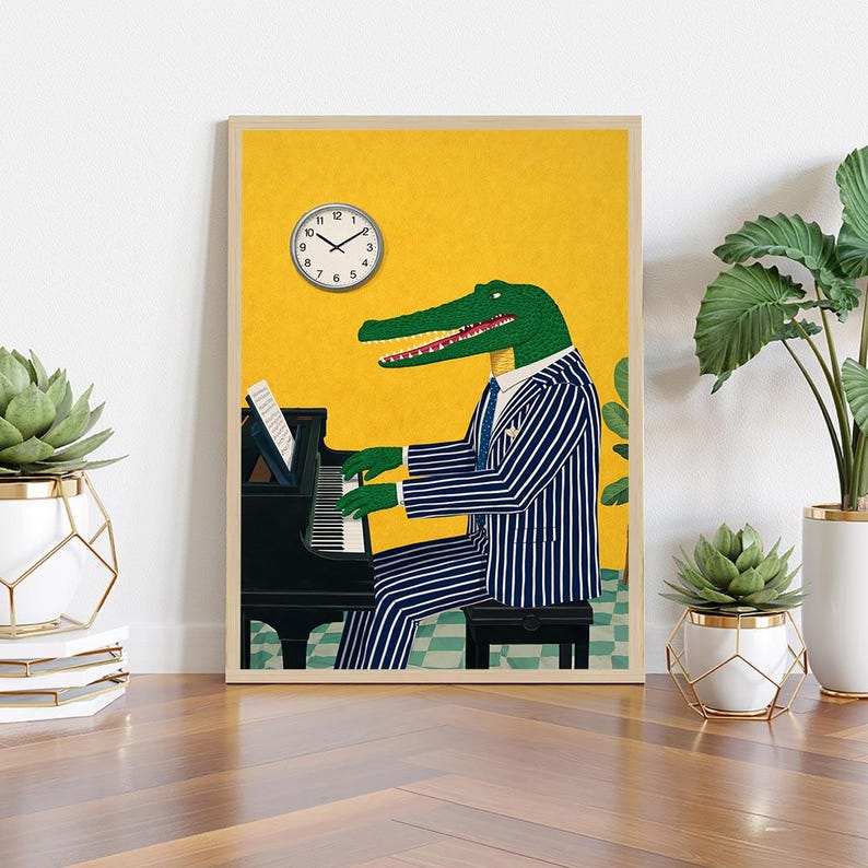 May include: A framed art print featuring an alligator playing a black piano. The alligator is wearing a pinstripe suit and tie. A clock is on the yellow wall. The print is displayed on a wooden surface with plants in the foreground.
