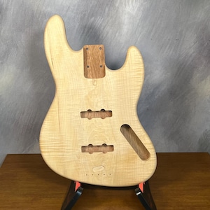 High end Offset Bass Body NOS Maple Top- Mahogany 1 piece accent wood- Back solid one piece  Butternut Unfinished -  Luthier Supply R29