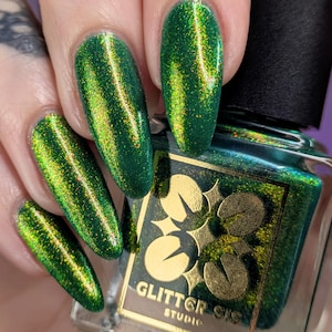 Giggles and Greenery: Zingy Green Nail Polish with Gold and Red Shimmers