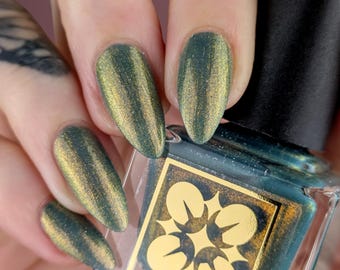 Perhaps Now, We Can Both Be Human: Teal Nail Polish with Orange-Gold Shimmer