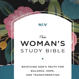 May include: The Woman's Study Bible with a floral design. The cover features the text "The Woman's Study Bible" in large, bold letters. The background has a dark floral pattern with pink and blue flowers. The text "Receiving God's Truth for Balance, Hope, and Transformation" is also visible.