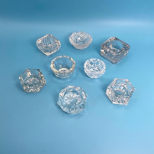 May include: A set of three ceramic mugs with a speckled, matte finish. The mugs are in shades of cream, light brown, and dark brown. Each mug has a simple, minimalist design, perfect for coffee or tea.