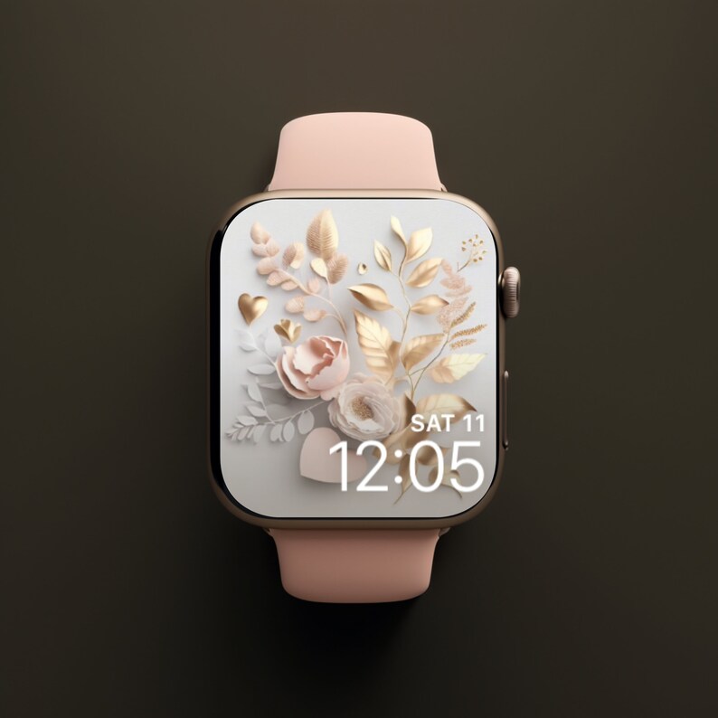 May include: A pink and gold smartwatch with a floral design and the time 12:05 displayed on the screen. The screen also shows the date, SAT 11.