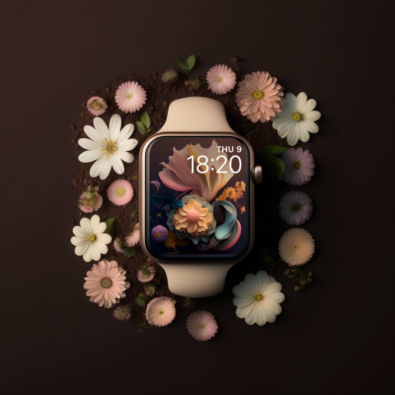 May include: A gold smartwatch with a floral watch face displaying the time "18:20" and the date "THU 9". The watch is surrounded by pink and white flowers on a brown background.