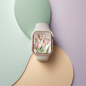 May include: A white smartwatch with a rose gold band and a floral watch face. The watch face displays the time as 22:20 and the date as SUN 26.