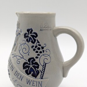 Vintage German Salt Glaze Wine Pitcher: Rustic Charm with Cobalt Accents!
