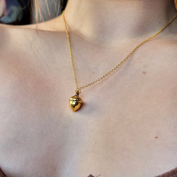 Carved Stone Acorn Pendant With Gold Balls main image 0