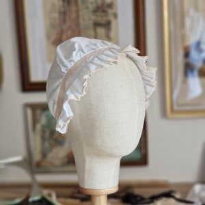 1760 white and pink linen bonnet