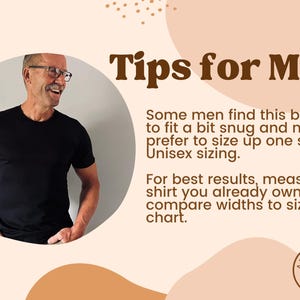May include: Tips for men on sizing for a black t-shirt. The text reads "Some men find this brand to fit a bit snug and may prefer to size up one size. Unisex sizing. For best results, measure a shirt you already own and compare widths to size chart."