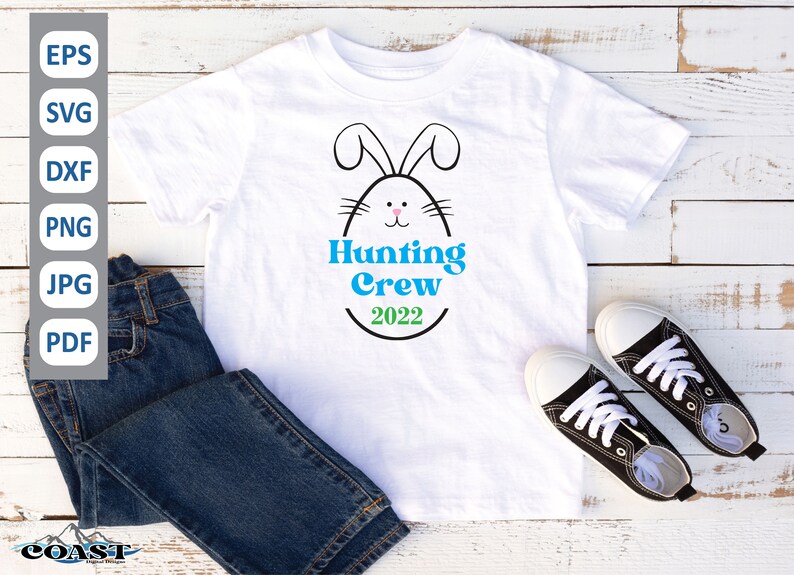May include: White t-shirt with a black and white bunny rabbit inside an egg with the text "Hunting Crew 2022" in blue and green.