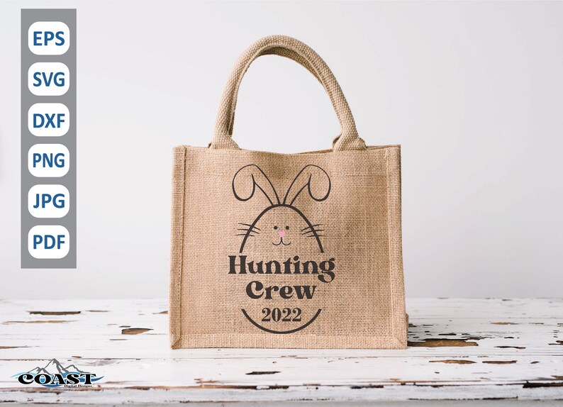 May include: A brown burlap tote bag with a black bunny silhouette and the text "Hunting Crew 2022".